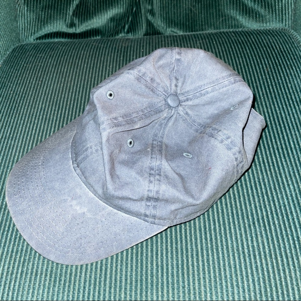 Denim plain hat with adjustable strap on the back.